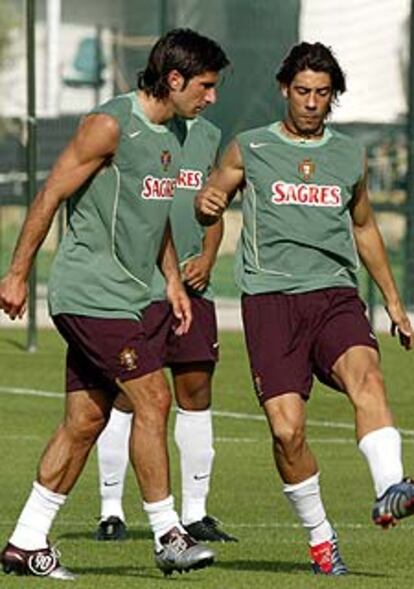 Figo y Rui Costa, durante un entrenamiento.