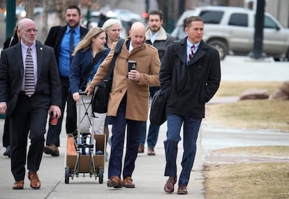 Michael J. Allen, front right, district attorney for Colorado's Fourth Judicial District, leads a contingent of lawyers into the El Paso County courthouse for a preliminary hearing for the alleged shooter in the Club Q mass shooting Wednesday, Feb. 22, 2023, in Colorado Springs, Colo.