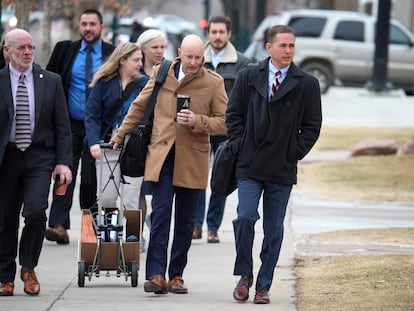 Michael J. Allen, front right, district attorney for Colorado's Fourth Judicial District, leads a contingent of lawyers into the El Paso County courthouse for a preliminary hearing for the alleged shooter in the Club Q mass shooting Wednesday, Feb. 22, 2023, in Colorado Springs, Colo.