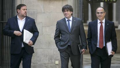 Oriol Junqueras, Carles Puigdemont y Jordi Turull acuden a la reuni&oacute;n del Gobierno. 