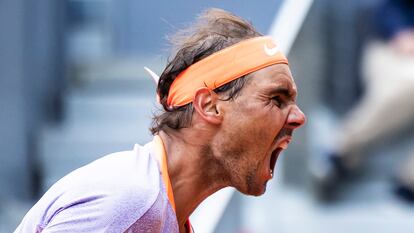 Nadal celebra un punto durante el partido contra Cachín en la Caja Mágica.