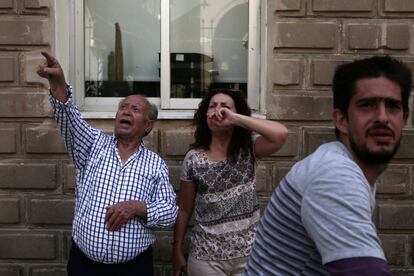 People react at the village of Plomari on the Greek island of Lesbos, Greece, after a strong earthquake shook the eastern Aegean, June 12, 2017. REUTERS/Elias Marcou
