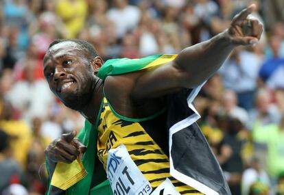 Bolt hace su gesto característico tras vencer en los 100m.