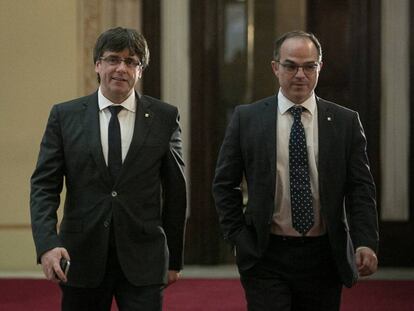 Carles Puigdemont y Jordi Turull.