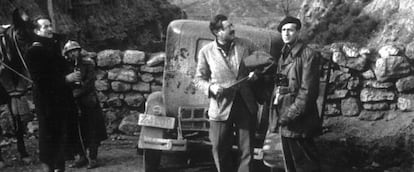 Ernest Hemingway, wearing glasses, pictured during the Spanish Civil War.