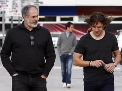 Puyol, a la derecha, junto a Andoni Zubizarreta.