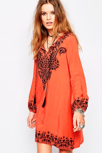 Naranja con mangas abullonadas, una propuesta de Glamorous disponible en Asos (48,99 euros).