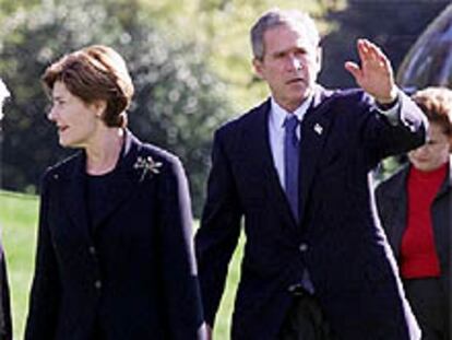 El presidente Bush con su esposa Laura.