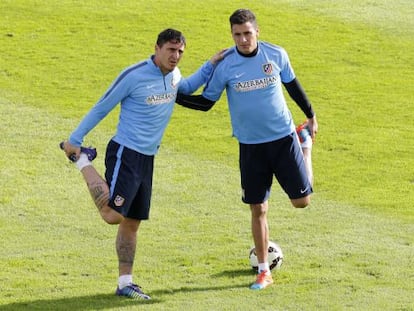 Christian Rodríguez y José María Giménez, en un entrenamiento.