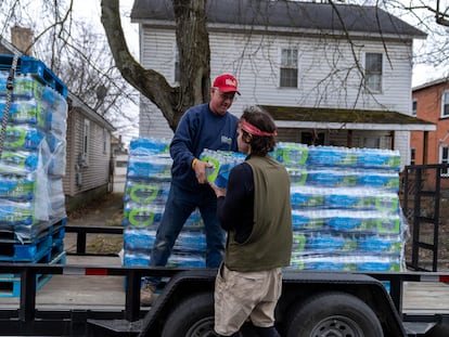 Michael Young passes out water to residents on February 16, 2023 in East Palestine, Ohio. On February 3rd, a Norfolk Southern Railways train carrying toxic chemicals derailed causing an environmental disaster.