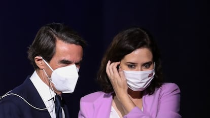 José María Aznar, junto a Isabel Díaz Ayuso, en un acto público el pasado 25 de junio, en Madrid.