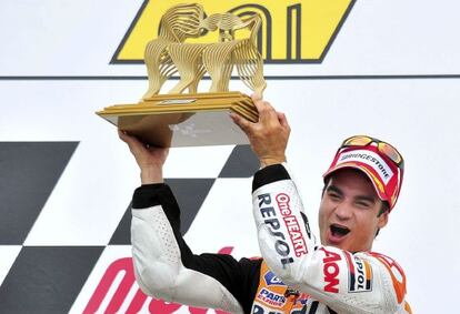 Dani Pedrosa celebrates on the podium after winning the German MotoGP at the Sachsenring.