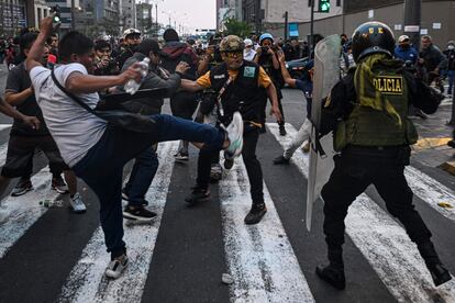 Supporters of Pedro Castillo clash with the police, on December 9.