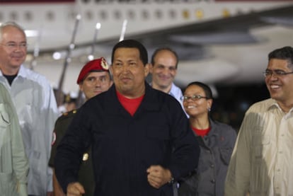 A beaming Chávez returns to Caracas on Saturday night.