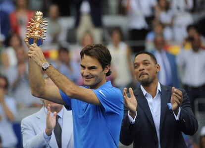 Will Smith aplaude a Federer.