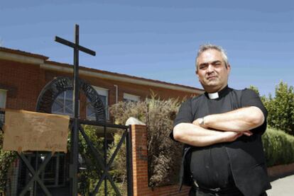 Father Andrés García Torres, outside his parish church in Fuenlabrada.