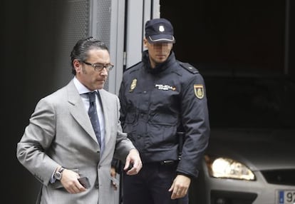 Ex-director of CAM's international and hotel division César Veliz leaves the High Court in Madrid after appeaing before a judge in fraud case.