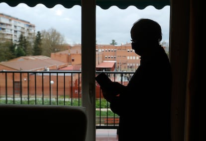 Caption: Angel, a victim of online fraud, at his home.