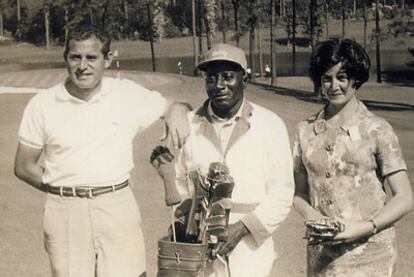 Ramón Sota en Augusta con su caddie y su esposa.