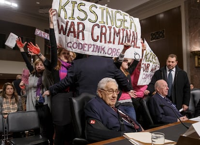 Protesters at Henry Kissinger's appearance before the U.S. Senate in 2015