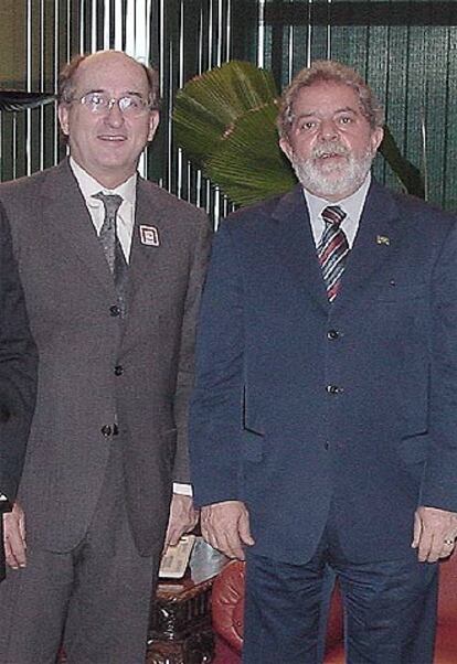 Antoni Brufau (izquierda), junto a Luiz Inázio Lula da Silva.