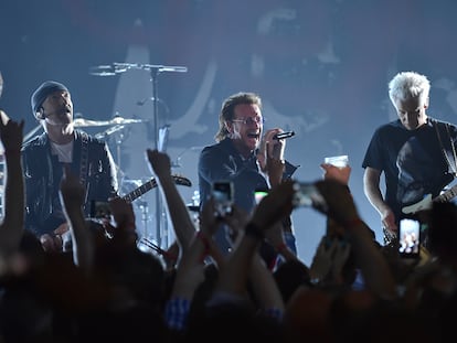 FILE - The Edge, from left, Bono and Adam Clayton of U2 perform during a concert at the Apollo Theater on June 11, 2018, in New York. The band's “UV Achtung Baby” first residency show at the Sphere venue in Las Vegas opened Friday night, Sept. 29, 2023. (Photo by Evan Agostini/Invision/AP, File)