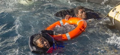 Two would-be immigrants traveling in an overcrowded plastic boat are rescued in the Strait on Monday