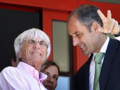 El empresario Ecclestone y el expresidente Camps durante un Gran Premio en Valencia.