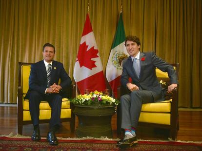 Enrique Peña Nieto y Justin Trudeau en la reunión de Líderes del APEC.