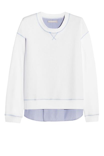 Sudadera con 'falsa' camisa de rayas debajo. Es de Richard Nicoll (290,40 euros).