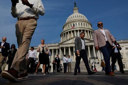 Visitors walk on the plaza at the U.S. Capitol in the midst of ongoing negotiations seeking a deal to raise the United States' debt ceiling and avoid a catastrophic default, in Washington, U.S. May 24, 2023. REUTERS/Jonathan Ernst