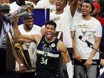 MILWAUKEE, WISCONSIN - JULY 20: Giannis Antetokounmpo #34 of the Milwaukee Bucks celebrates winning the Bill Russell NBA Finals MVP Award after defeating the Phoenix Suns in Game Six to win the 2021 NBA Finals at Fiserv Forum on July 20, 2021 in Milwaukee, Wisconsin. NOTE TO USER: User expressly acknowledges and agrees that, by downloading and or using this photograph, User is consenting to the terms and conditions of the Getty Images License Agreement.   Jonathan Daniel/Getty Images/AFP
== FOR NEWSPAPERS, INTERNET, TELCOS & TELEVISION USE ONLY ==