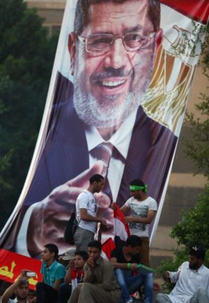 Fotos de Morsi en Ciudad Nasser.