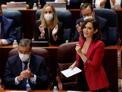 La presidenta de la Comunidad de Madrid, Isabel Díaz Ayuso, interviene en el pleno de la Asamblea, este jueves.