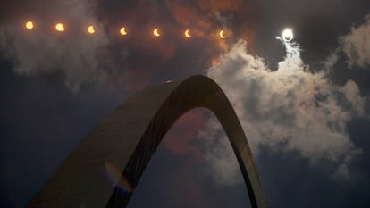 A multiple exposure photograph shows the progression of a solar eclipse over St. Louis on August, 2017.