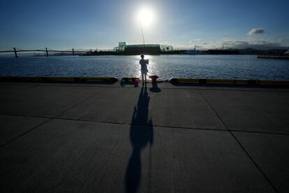 An angler fishes at Onahama Port in Iwaki, northeastern Japan, 68 kilometers (42 miles) from the Fukushima Daiichi nuclear power plant, on Friday, Aug. 25, 2023.