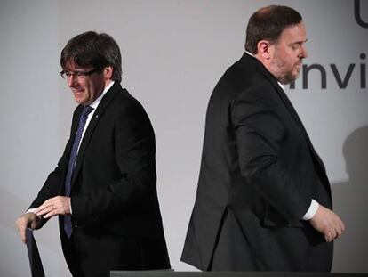 El presidente de la Generalitat, Carles Puigdemont, junto a Oriol Junqueras.