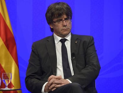 El presidente de la Generalitat, Carles Puigdemont, este domingo. En vídeo, declaraciones de la CUP.