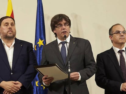 Jordi Turull, a la derecha, con Puigdemont y Junqueras.