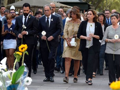 El presidente Torra y Laura Masvidal, en el centro.