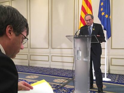 El 'president' Quim Torra pronuncia su conferencia con Puigdmont en la primera fila, este lunes en un hotel de Bruselas. En vídeo, declaraciones del conseller de Interior de la Generalitat, Miquel Buch.