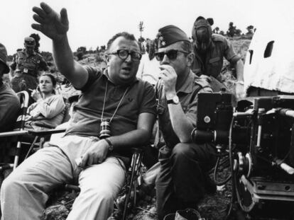 Sergio Leone and a Spanish soldier in July 1966.