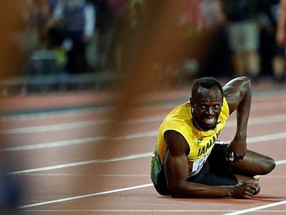 FOTO: Usain Bolt, lesionado en el suelo en la final de 4x100m. / VÍDEO: La última carrera de Bolt.