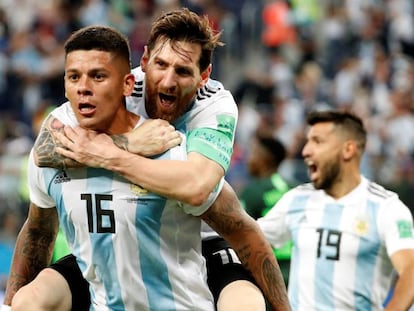 Messi celebra con Rojo el gol que dio el triunfo a Argentina. En vídeo, declaraciones de Messi tras el partido.