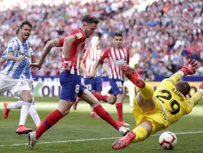 FOTO: Saúl bate a Lunin después de detenerle este el penalti. / VÍDEO: Declaraciones de Simeone tras el partido.