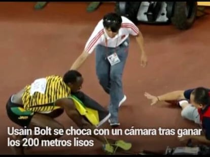 El susto de Bolt, atropellado por un cámara cuando festejaba el triunfo