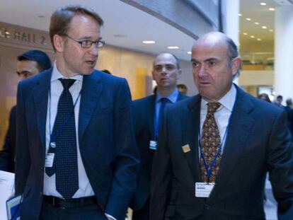 Jens Weidmann (izquierda) junto a Luis de Guindos, en una reunión del G-20 en Washington.