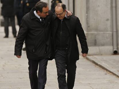 Josep Rull y Jordi Turull a su llegada a la sede del Tribunal Supremo en Madrid.