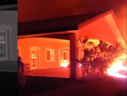 Un vecino graba el momento en que la lava del volcán Kilauea incendia unas casas