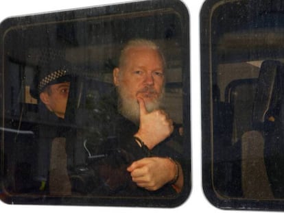 Assange after his arrest in London. Video: The Spanish security company UC Global opened up and photographed the cellphones of American journalists who visited Assange at the Ecuadorian embassy in London.